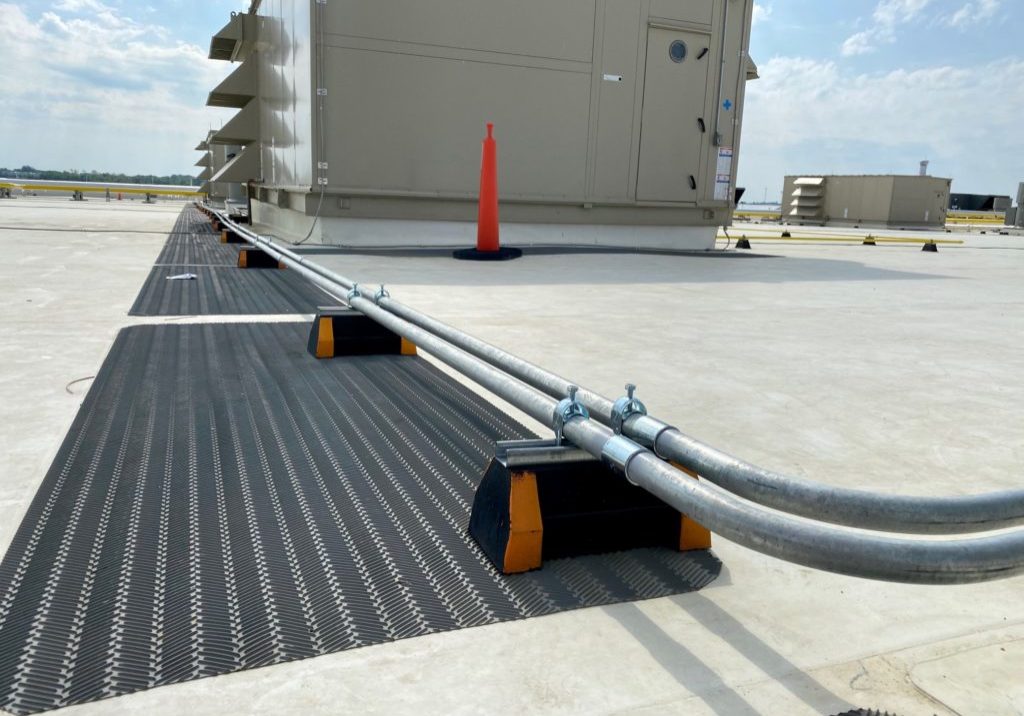 Rooftop Electrical Conduit And Condensate Pipe Supports Unistrut My